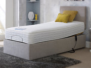 A cozy adjustable bed featuring a comfortable mattress and supportive box spring, perfect for a restful night's sleep.