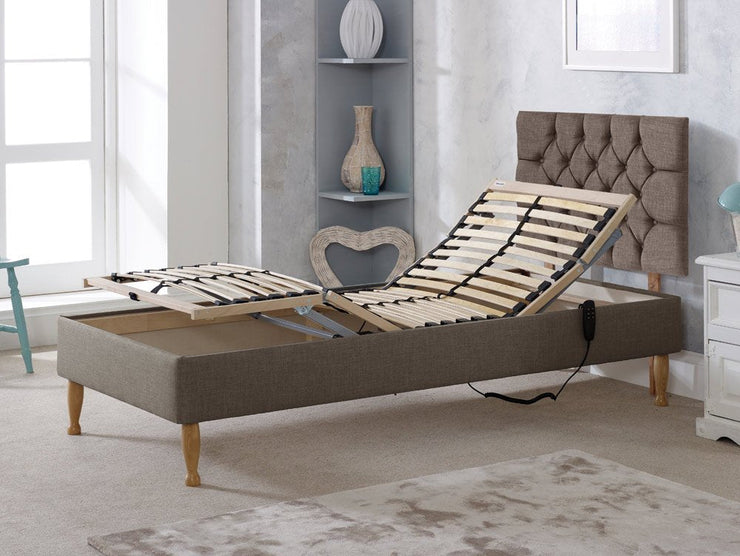 A cozy adjustable bed featuring a stylish headboard.