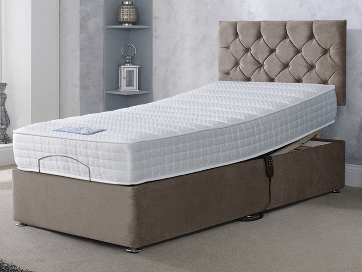 A cozy adjustable bed featuring a comfortable mattress.