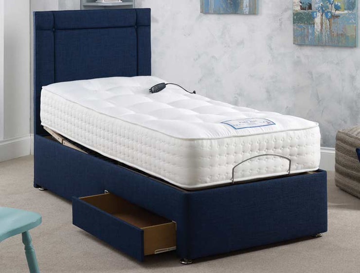 Cozy blue adjustable bed with a plush mattress and matching blue headboard for a serene bedroom vibe.